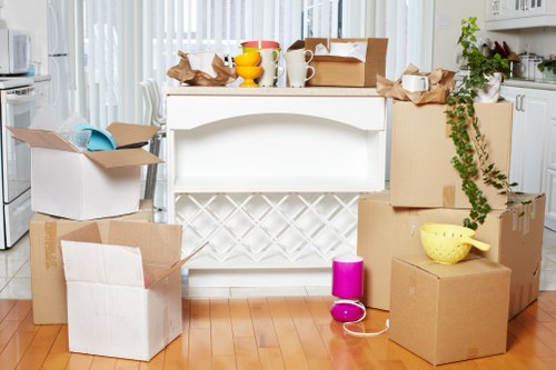 Professional movers loading household items carefully for transport