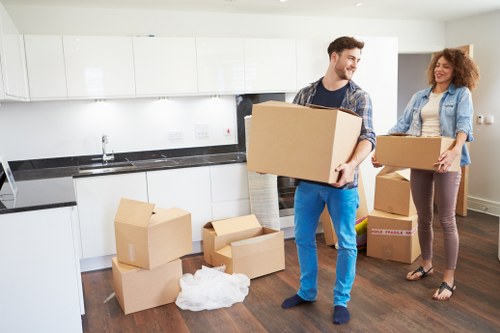 Securely packed items being loaded with professional moving equipment
