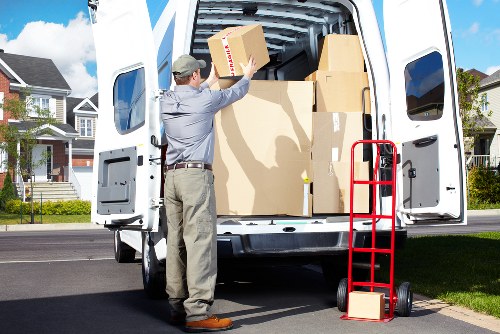 Professional movers packing and handling household items