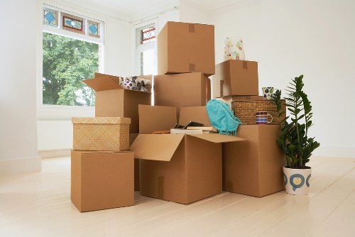 Furniture and boxes being loaded into a moving van